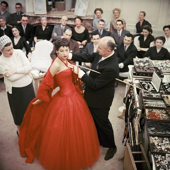 Christian Dior with fashion model Victoire wearing the "Zaire" dress (Autumn-Winter Haute Couture collection, H line) 1954 © 2013 Mark Shaw